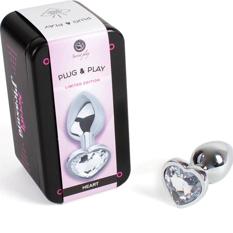SECRETPLAY - METAL BUTT PLUG CORAZÓN TRANSPARENTE TALLA S 7 CM - Optelum